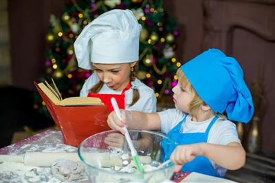 picture of two kids baking with flour on their noses and smiling picture of two kids baking with flour on their noses and smiling